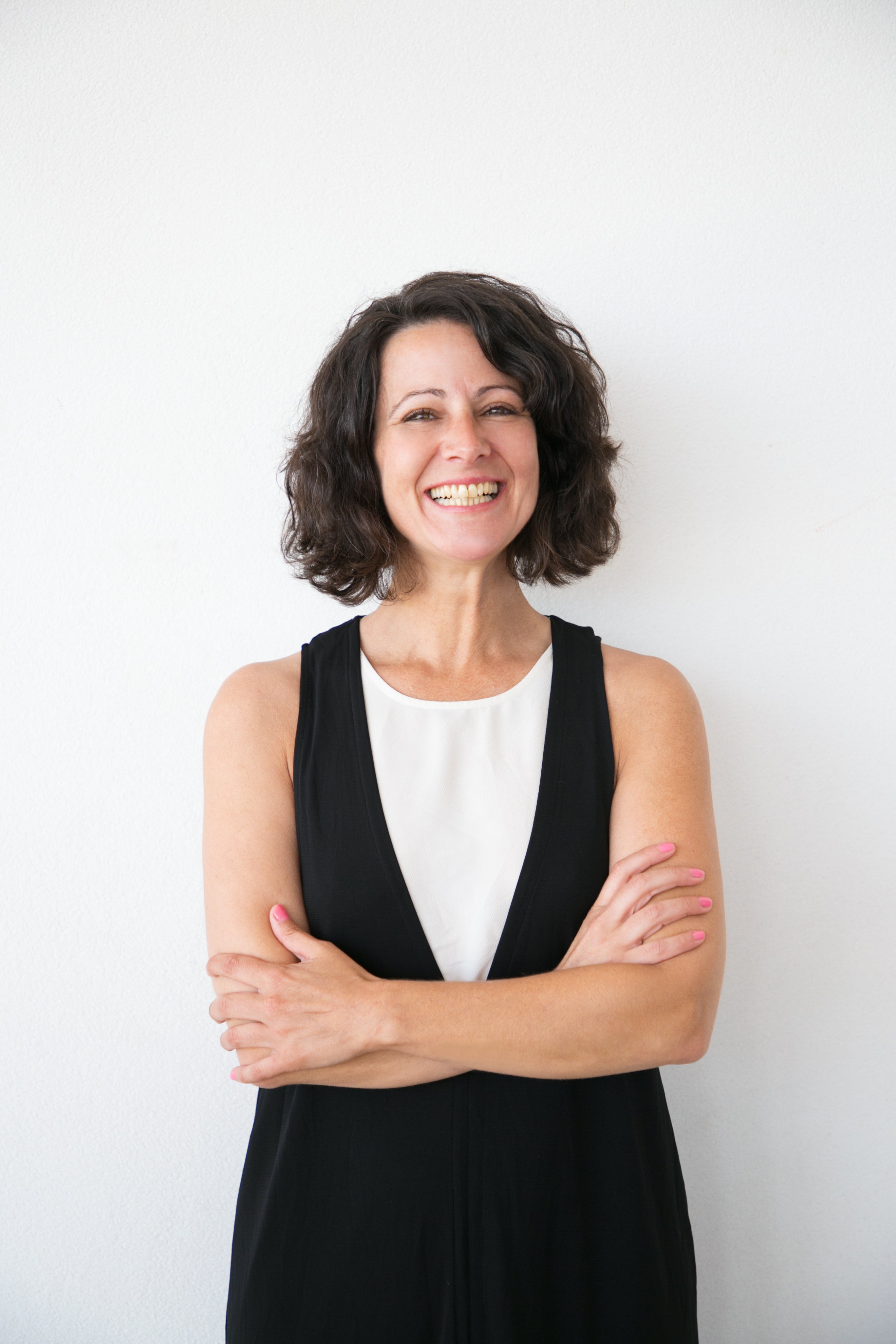 files/happy-successful-woman-posing-with-folded-arms.jpg